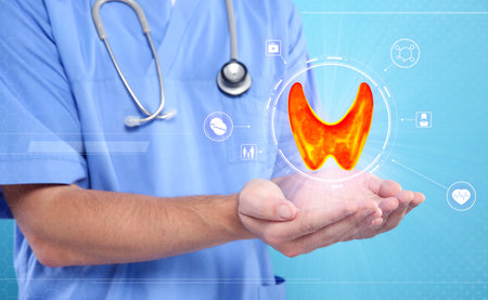 Diagnosis and treatment of thyroid diseases. Endocrinologist holding virtual scheme with unhealthy...