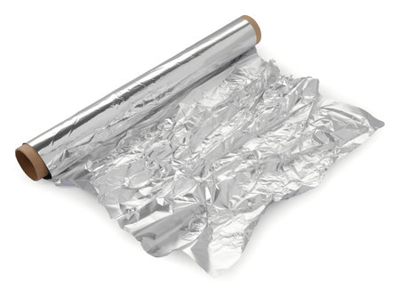Roll of aluminum foil isolated on whiteの写真素材