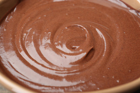 Closeup view of melted chocolate in fondueの写真素材