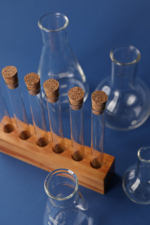 Different laboratory glassware on blue background, above viewの写真素材
