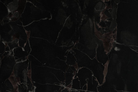 Black marble surface as background, closeup viewの写真素材