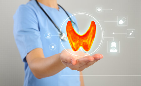 Diagnosis and treatment of thyroid diseases. Endocrinologist holding virtual scheme with unhealthy...