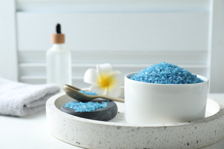 Composition with blue sea salt on white table indoors, closeupの写真素材