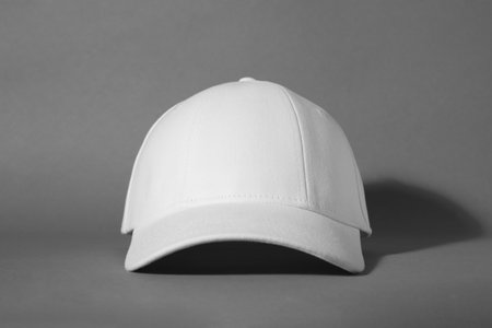 Stylish white baseball cap on gray backgroundの写真素材