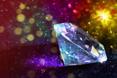 Beautiful diamond on shiny glitter, bokeh effect. Space for textの写真素材