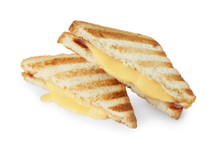 Tasty sandwiches with ham and melted cheese isolated on whiteの写真素材