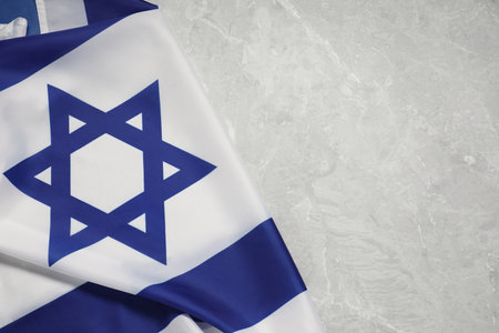 Flag of Israel on gray marble background, top view and space for text. National symbolの写真素材
