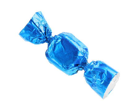 Tasty candy in light blue wrapper isolated on whiteの写真素材
