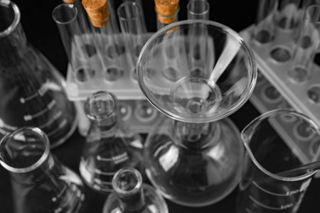 Different laboratory glassware on black background, above viewの写真素材