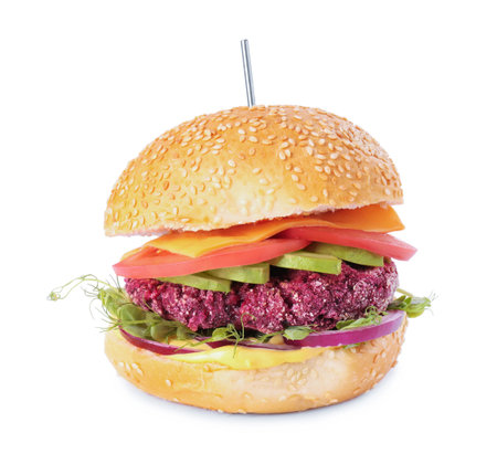Tasty vegetarian burger with beet cutlet, cheese, avocado and tomato isolated on whiteの写真素材