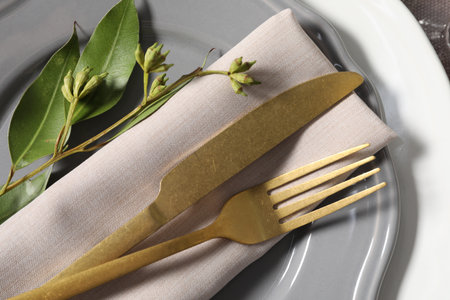 Beautiful table setting with floral decor, closeup