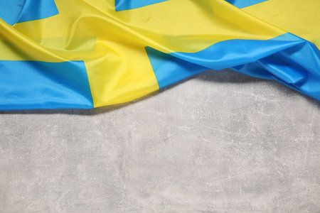 Flag of Sweden on light gray textured background, top view. Space for textの写真素材