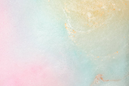 Colorful foam after dissolving bath bomb in water, closeupの写真素材