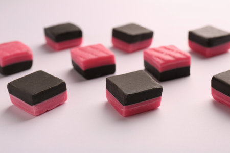 Tasty liquorice candies on light background, closeupの写真素材