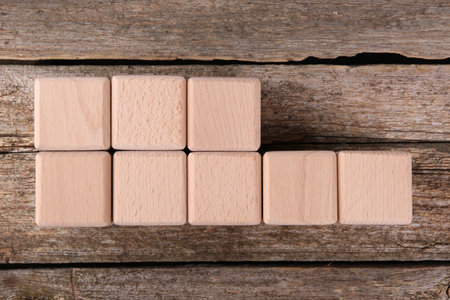 International Organization for Standardization. Cubes with abbreviation ISO 22000 on wooden table, top viewの写真素材