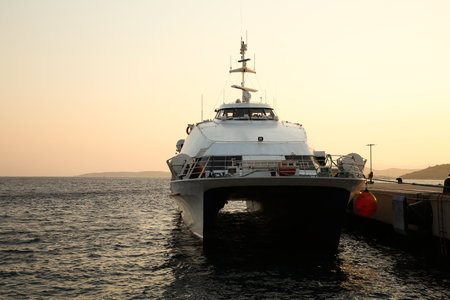 Picturesque view of modern ferry moored in sea port