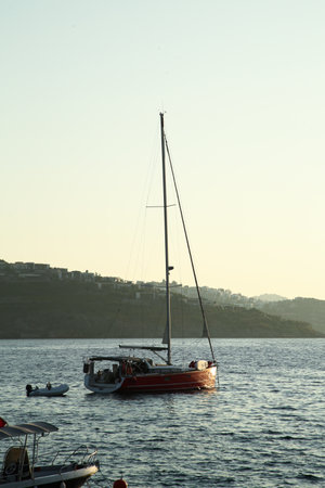 Beautiful view of calm sea with yacht and boats on summer day