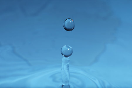 Splash of blue water with drop, macro viewの写真素材