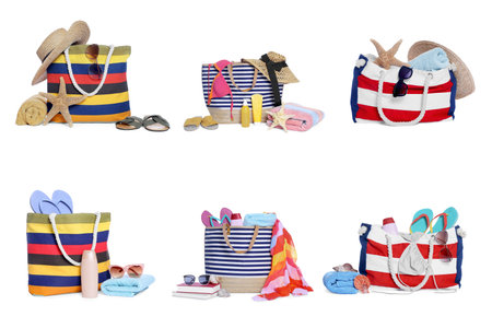 Different stylish bags and other beach accessories isolated on white, setの写真素材