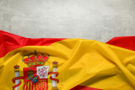 Flag of Spain on light gray textured background, top view. Space for textの写真素材