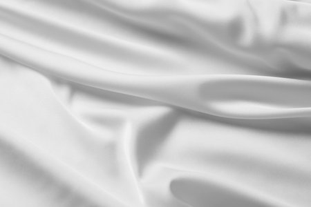 Texture of white silk ripple fabric as background, top viewの写真素材