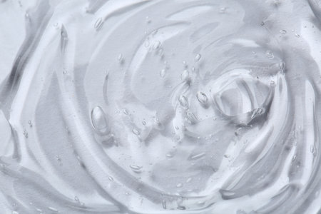 Cosmetic serum on white background, top viewの写真素材