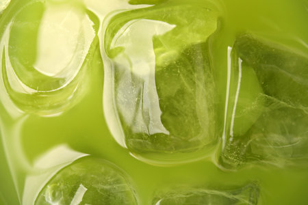 Delicious iced green matcha tea as background, closeupの写真素材