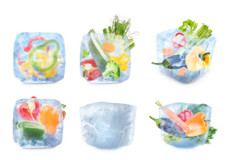 Different frozen vegetables and ice cube isolated on white, setの写真素材