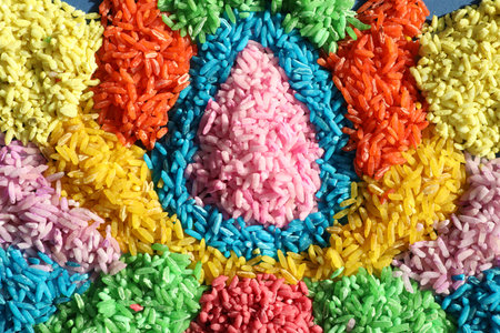 Diwali celebration. Colorful rangoli as background, top viewの写真素材