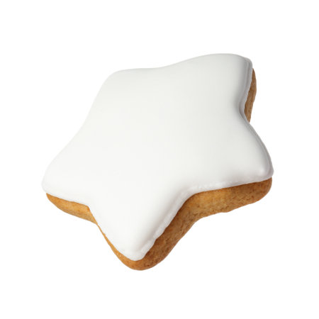 Tasty star shaped Christmas cookie with icing isolated on whiteの写真素材