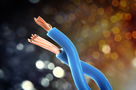 Electrical wires against dark background with blurred lights, closeup. Bokeh effectの写真素材