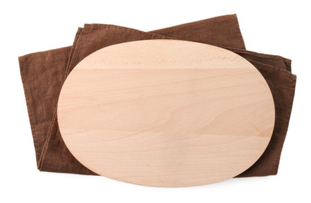 Wooden cutting board and kitchen towel on white background, top viewの写真素材