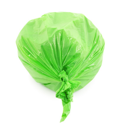 Green plastic garbage bag isolated on white, top viewの写真素材