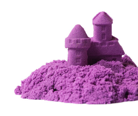 Castle made of purple kinetic sand isolated on whiteの写真素材