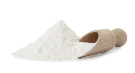Baking powder and scoop isolated on whiteの写真素材