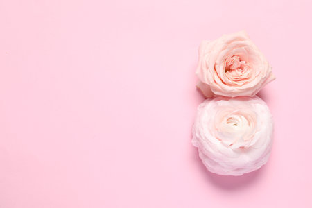 8 March greeting card design made with beautiful flowers on pink background, top view. Space for textの写真素材