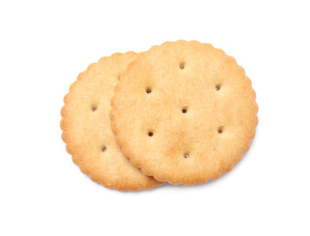 Two crispy crackers isolated on white, top view. Delicious snackの写真素材