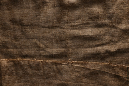 Texture of natural burlap fabric as background, top view
