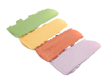 Different color correcting concealers isolated on whiteの写真素材