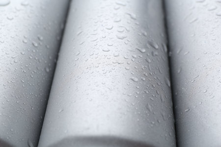 Energy drinks in wet cans as background, closeupの写真素材