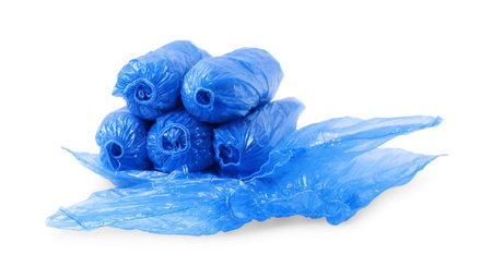 Blue medical shoe covers isolated on whiteの写真素材