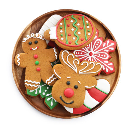 Different tasty Christmas cookies isolated on white, top view