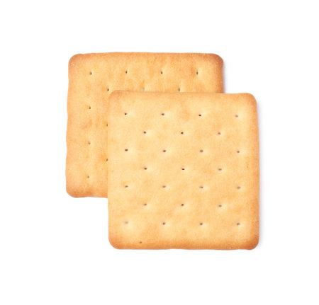 Two crispy crackers isolated on white, top view. Delicious snackの写真素材