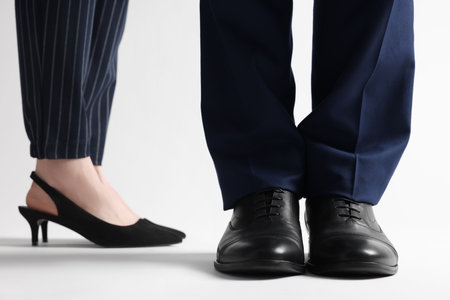 Businesswoman and businessman on white background, closeupの写真素材