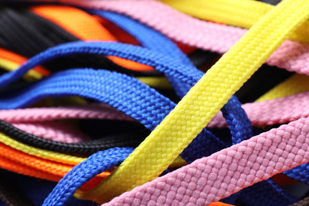 Many colorful shoe laces as background, closeupの写真素材