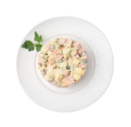 Tasty Olivier salad with boiled sausage isolated on white, top viewの写真素材