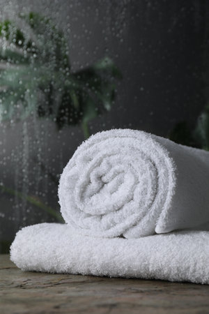 White terry towels on table in bathroomの写真素材
