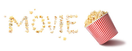 Word Movie made of popcorn and bucket of puffed kernels on white backgroundの写真素材