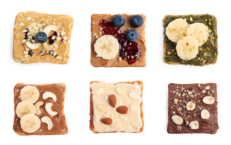 Different tasty nut butter sandwiches isolated on white, top viewの写真素材