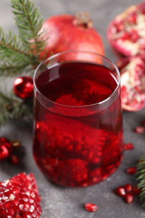 Aromatic Sangria cocktail in glass on gray table, closeup. Christmas drinkの写真素材